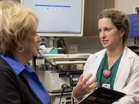 Female doctor speaking to a patient in a doctor's office