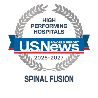 U.S. News and World Report 2026–2027 High Performing Hospitals badge for Spinal Fusion.
