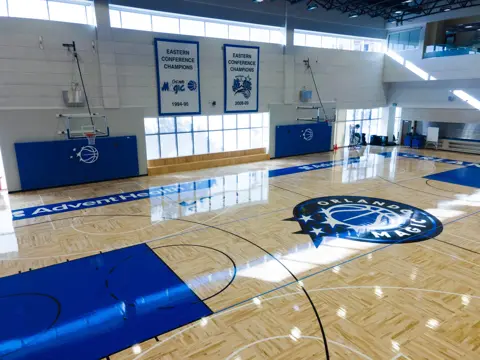 A high-angle view of the court at the AdventHealth Training Center.