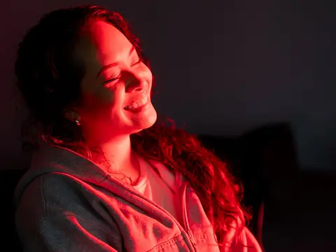 A woman receiving Red Light Therapy.