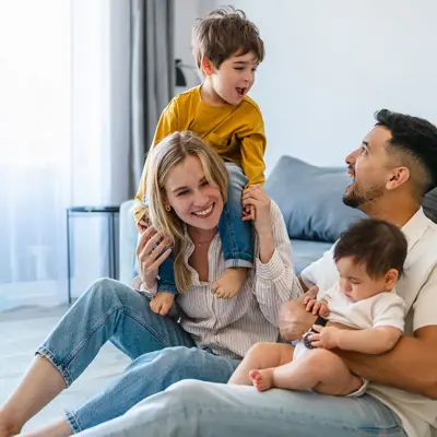 A happy family spending time together in the living room.