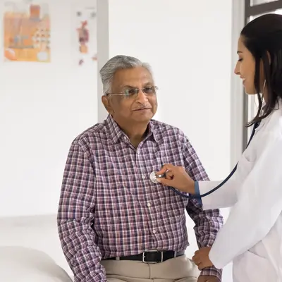 Provider examining patient's heart