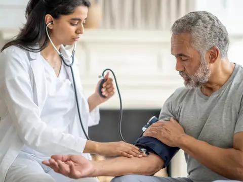 A Provider Checks a Patient's Blood Pressure